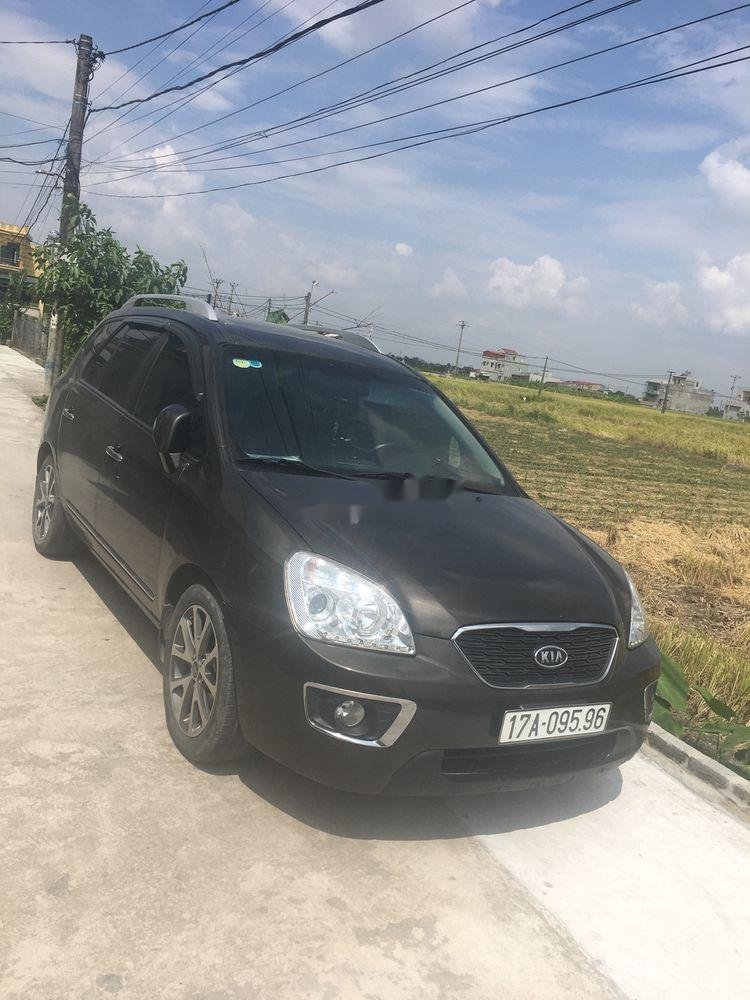 Kia Carens  MT 2014 - Cần bán Kia Carens MT năm sản xuất 2014, màu đen, 380 triệu