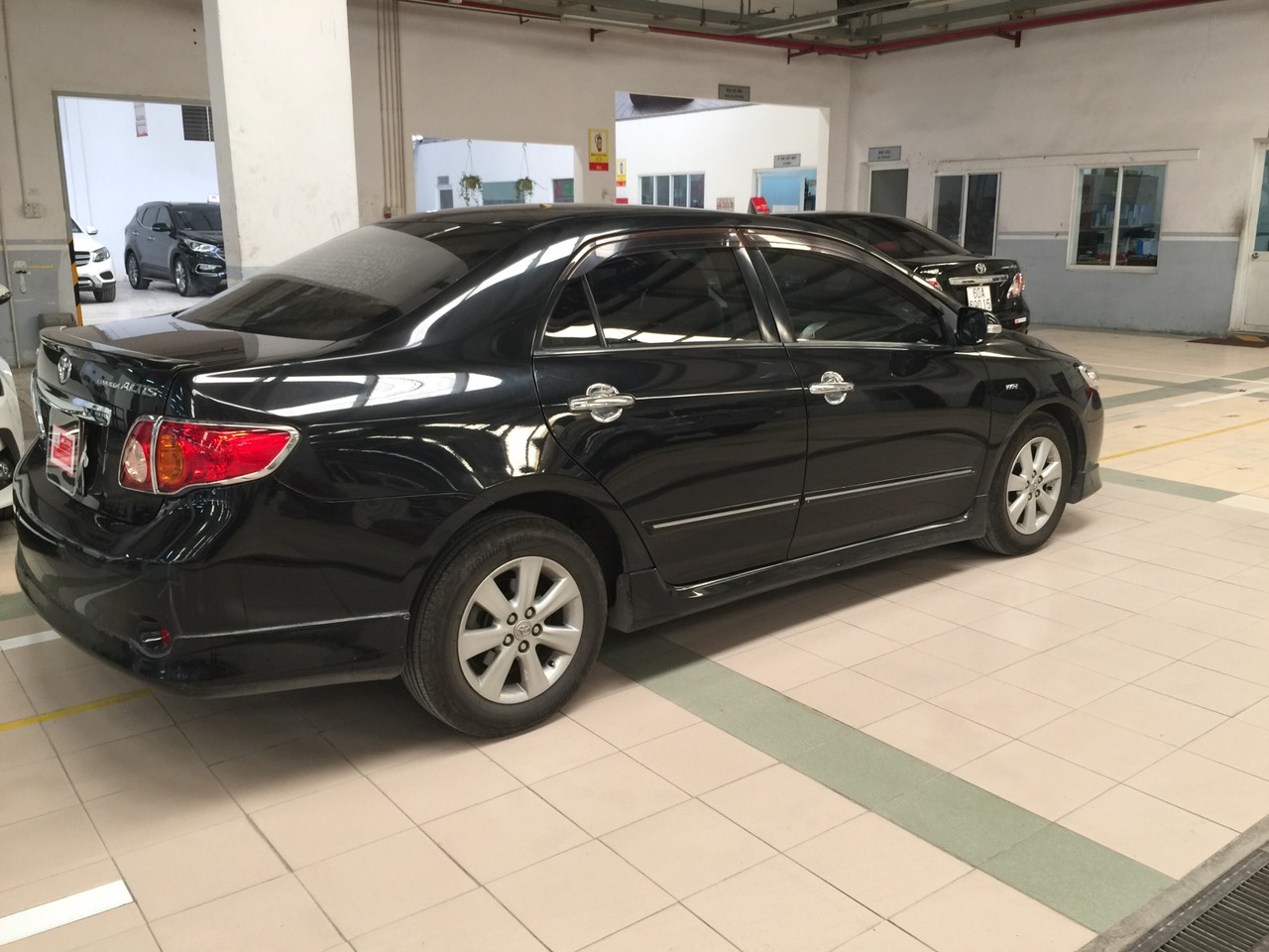 Toyota Corolla altis G 2009 - Bán xe Toyota Corolla Altis G đời 2009, màu đen