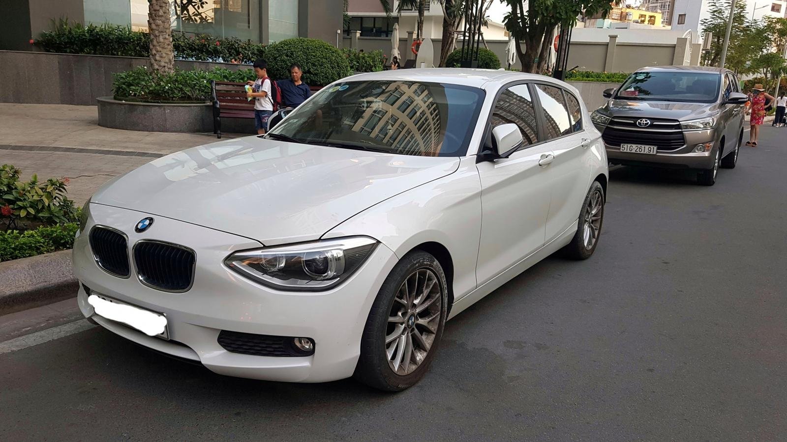 BMW 1 Series 116i 2013 - Bán ô tô BMW 1 Series 116i sản xuất năm 2013, màu trắng, xe nhập xe gia đình