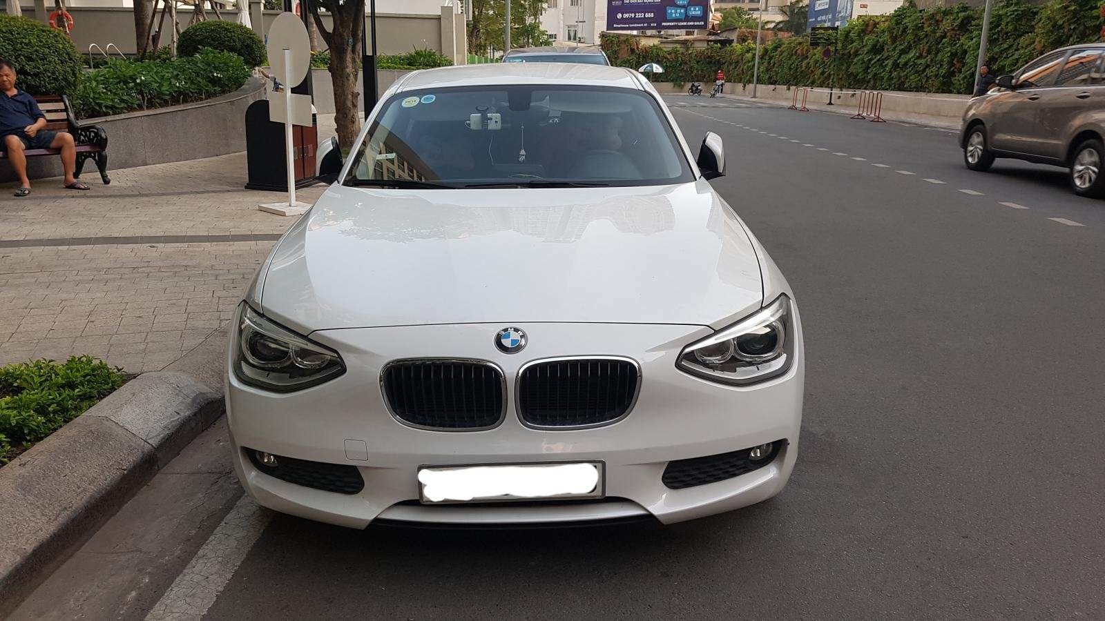 BMW 1 Series 116i 2013 - Bán ô tô BMW 1 Series 116i sản xuất năm 2013, màu trắng, xe nhập xe gia đình