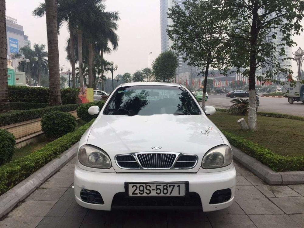 Daewoo Lanos MT 2003 - Cần bán Daewoo Lanos MT sản xuất năm 2003, màu trắng