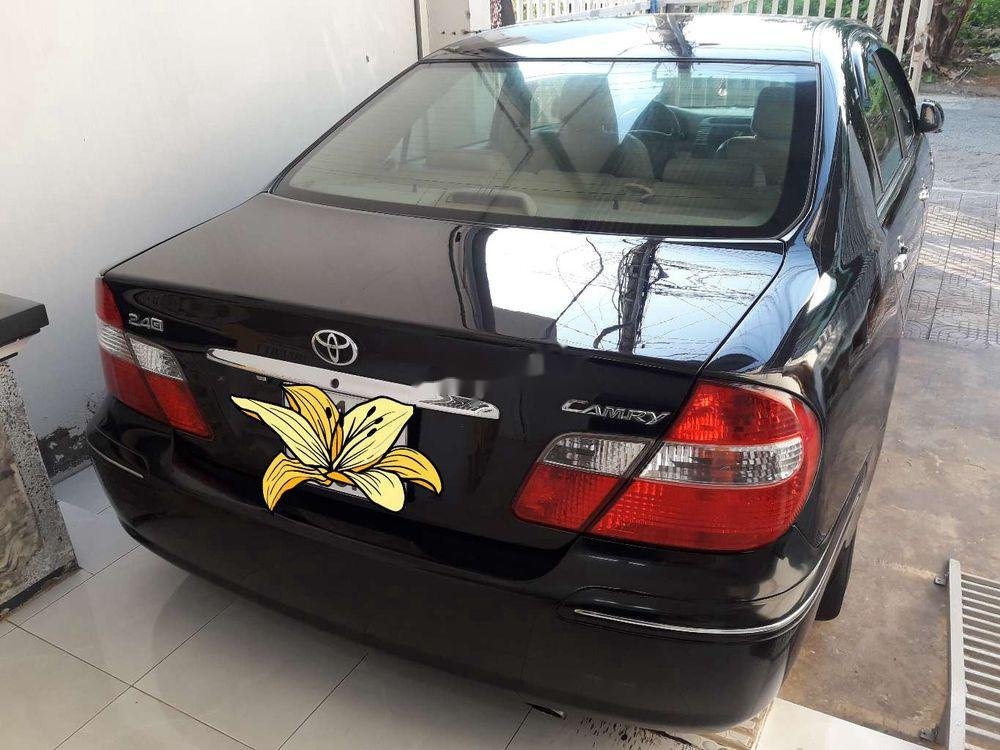 Toyota Camry  MT 2003 - Cần bán xe Toyota Camry MT sản xuất 2003, màu đen