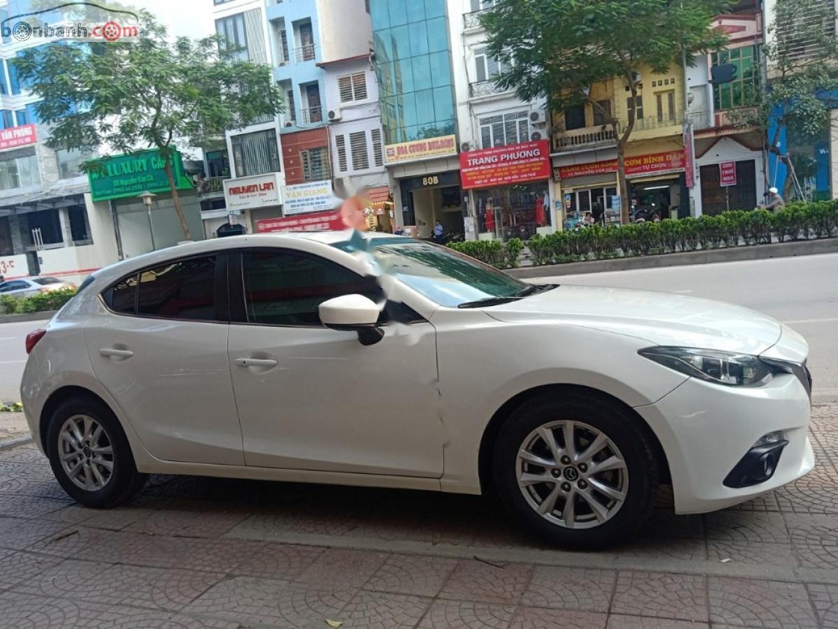 Mazda 3 1.5 AT 2016 - Bán Mazda 3 1.6 đời 2016, màu trắng, giá chỉ 535 triệu