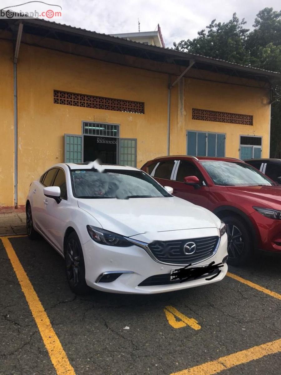 Mazda 6 Luxury 2.0 AT 2019 - Cần bán gấp Mazda 6 Luxury 2.0 AT đời 2019, màu trắng, giá 856tr