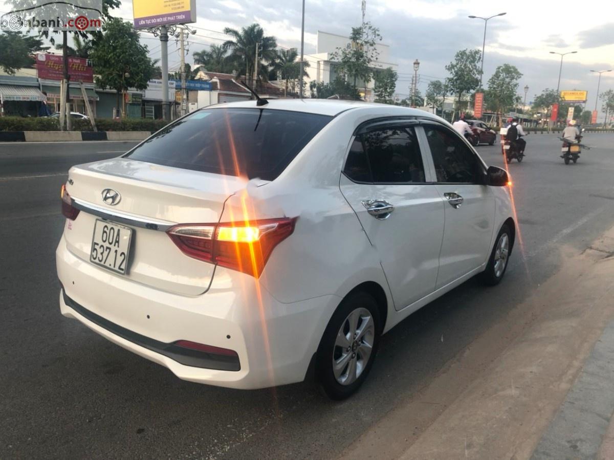 Hyundai Grand i10  1.2 AT 2018 - Bán Hyundai Grand i10 1.2 AT sản xuất năm 2018, màu trắng, giá 395tr