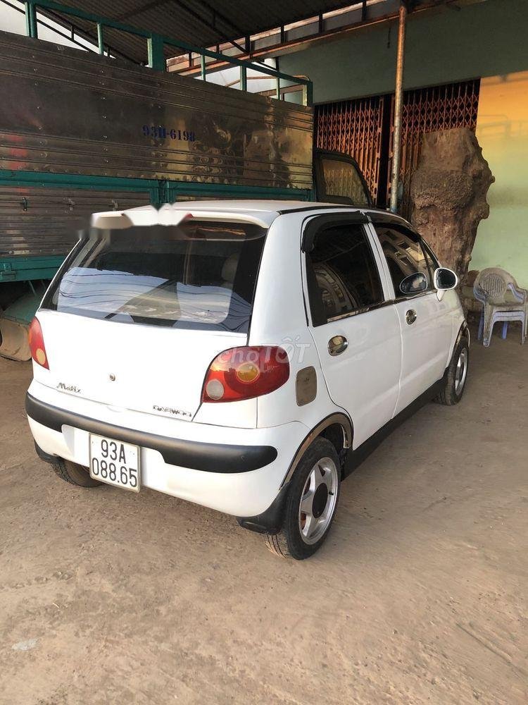 Daewoo Matiz 2002 - Bán xe Daewoo Matiz đời 2002, màu trắng, nhập khẩu đẹp như mới, 59 triệu