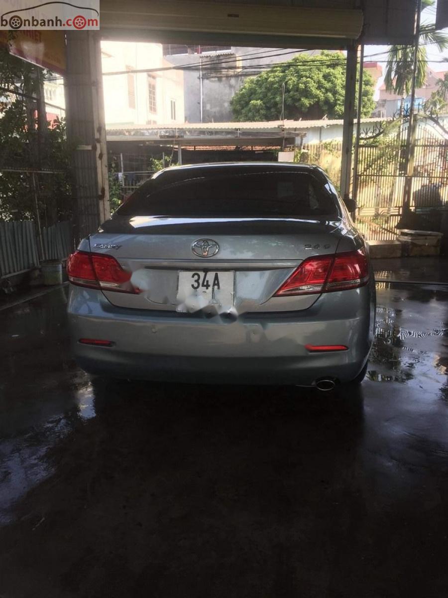 Toyota Camry   2010 - Cần bán xe Toyota Camry 2.4G sản xuất 2010, màu bạc