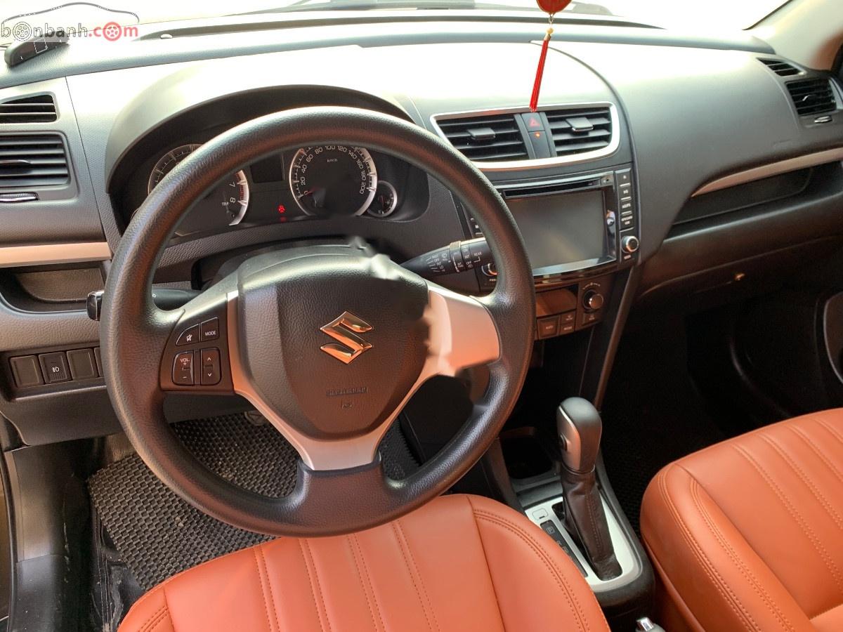 Suzuki Swift 1.4 AT 2014 - Cần bán xe Suzuki Swift 1.4 AT sản xuất 2014, màu nâu chính chủ, giá tốt