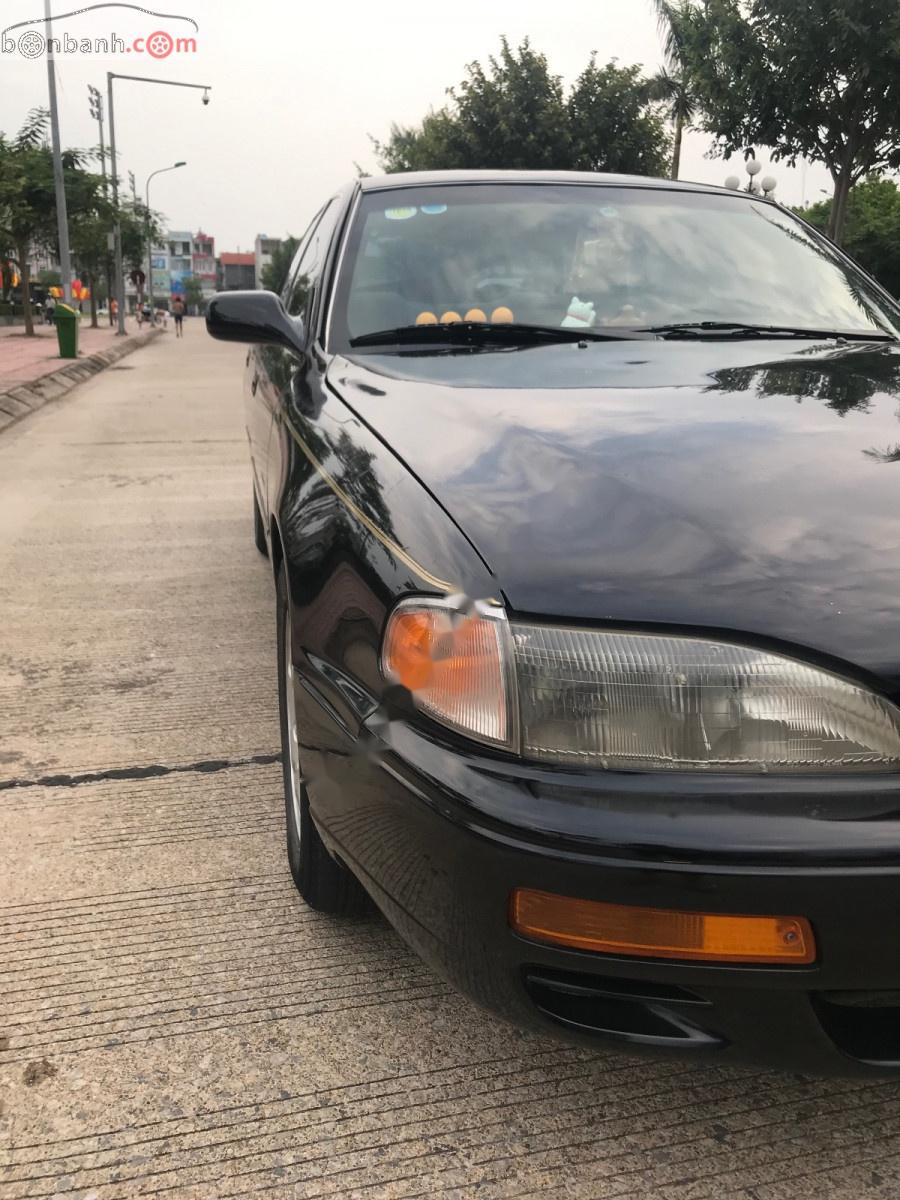 Toyota Camry XLE 3.0 AT 1995 - Bán Toyota Camry XLE 3.0 AT sản xuất năm 1995, màu đen, nhập khẩu xe gia đình