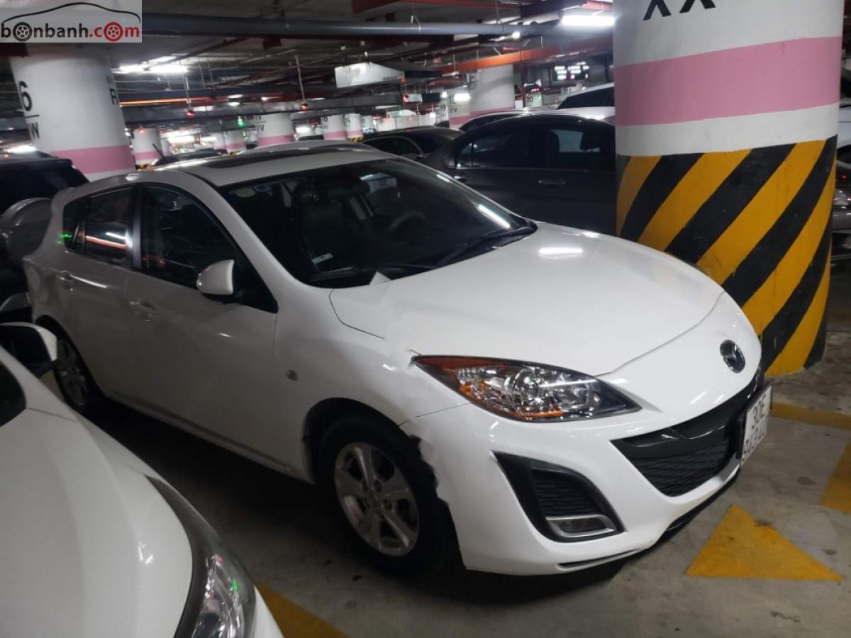 Mazda 3 2009 - Cần bán Mazda 3 1.6AT năm 2010, màu trắng, xe nhập chính chủ