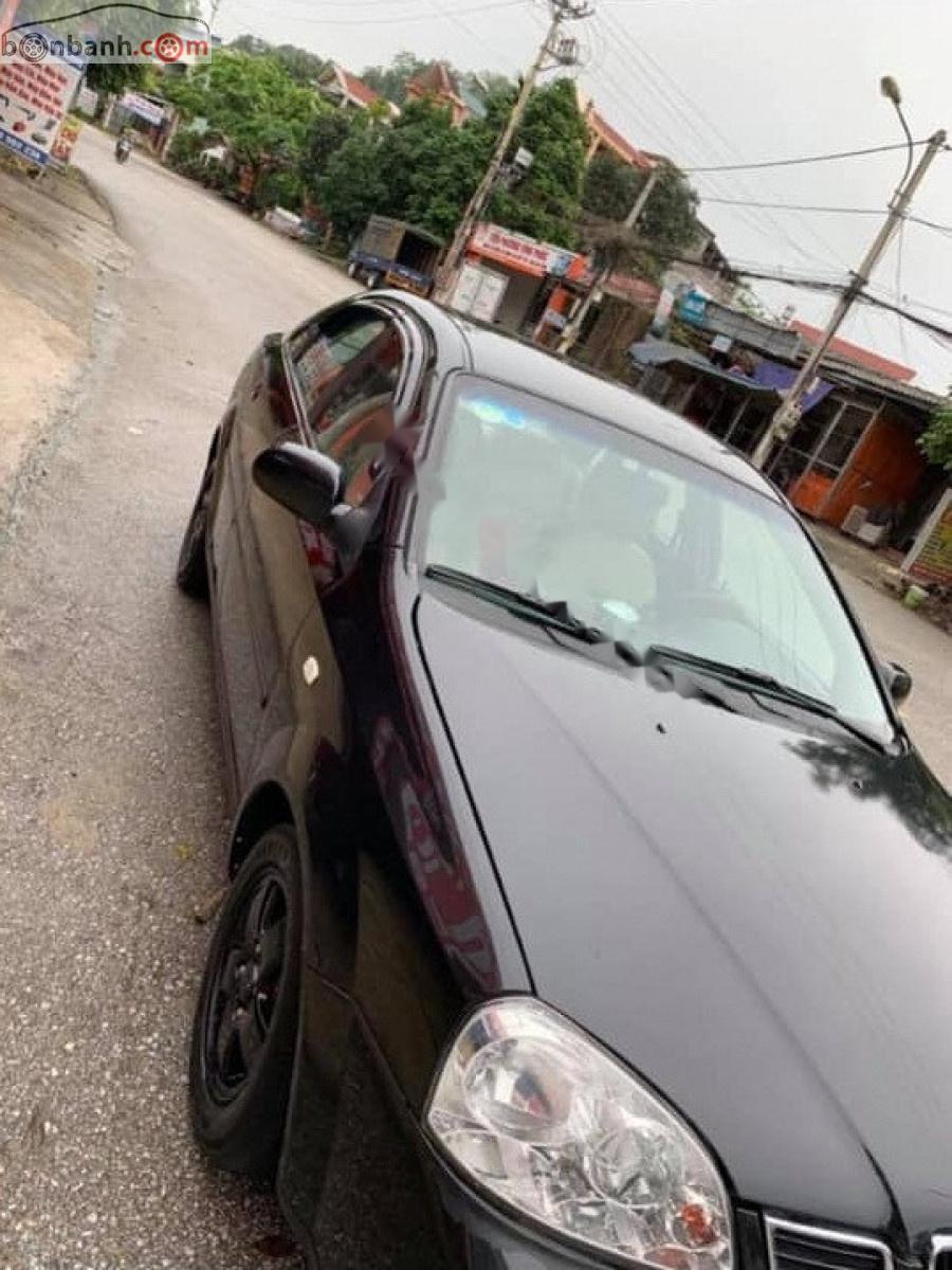 Daewoo Lacetti   2006 - Cần bán Daewoo Lacetti EX 1.6 MT đời 2006, màu đen