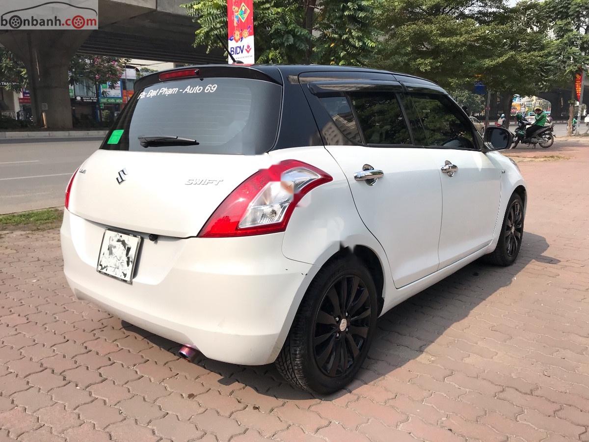 Suzuki Swift 1.4 AT 2017 - Cần bán xe Suzuki Swift 1.4 AT 2017, màu trắng chính chủ, giá chỉ 429 triệu