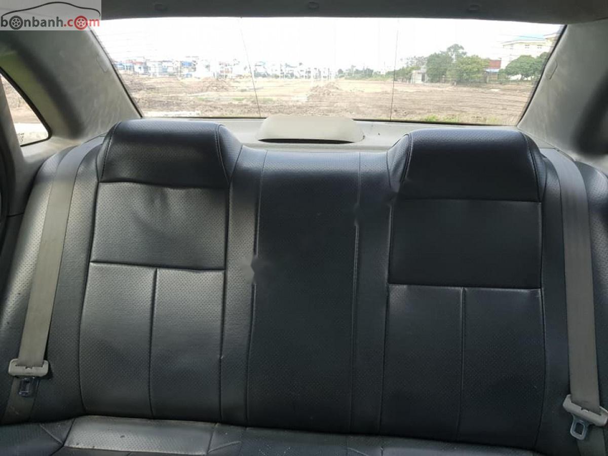 Daewoo Lacetti EX 1.6 MT 2005 - Cần bán lại xe Daewoo Lacetti EX 1.6 MT sản xuất năm 2005, màu trắng xe gia đình, 118tr