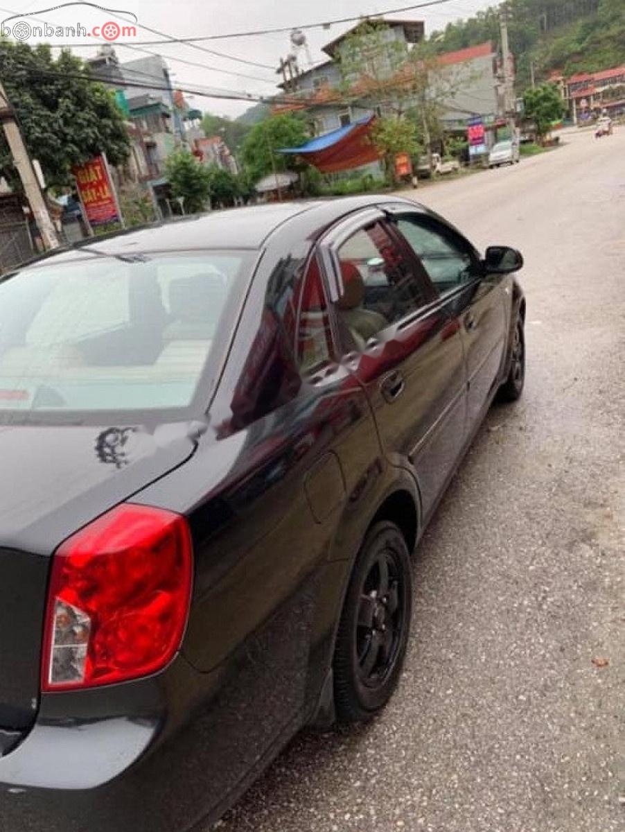 Daewoo Lacetti   2006 - Cần bán Daewoo Lacetti EX 1.6 MT đời 2006, màu đen