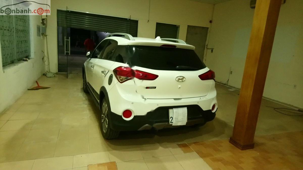Hyundai i20 Active   2015 - Cần bán Hyundai i20 Active 1.4AT năm 2015, màu trắng, nhập khẩu 