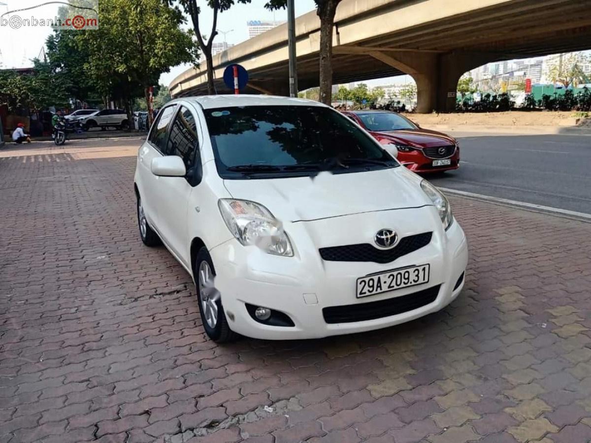 Toyota Yaris 1.3 AT 2011 - Cần bán lại xe Toyota Yaris 1.3 2011, màu trắng, nhập khẩu