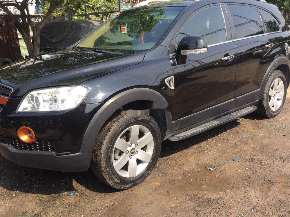 Chevrolet Captiva LT  2009 - Cần bán xe Chevrolet Captiva sản xuất năm 2009, màu đen số sàn, 253 triệu