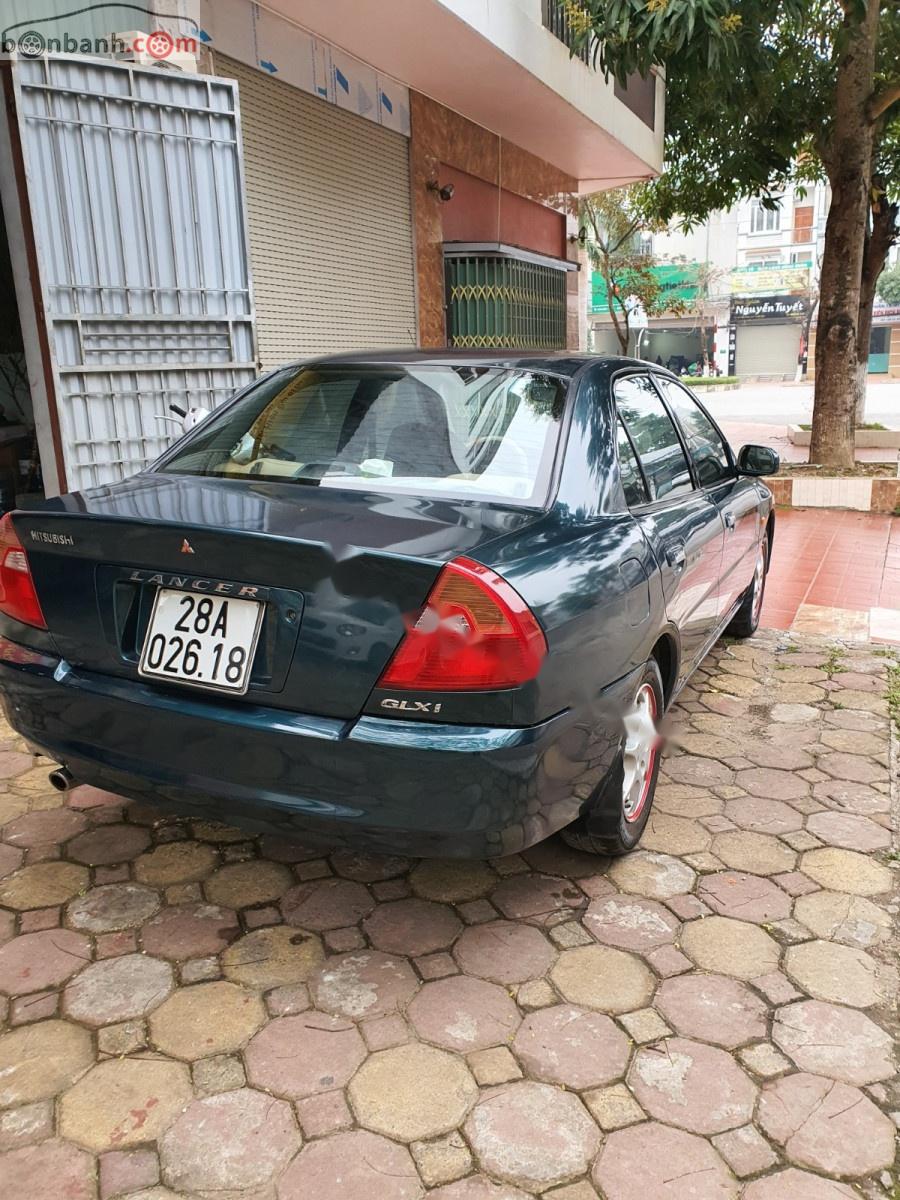 Mitsubishi Lancer GLXI 1.6 MT 2002 - Bán Mitsubishi Lancer sản xuất năm 2002, màu xanh lam, giá tốt