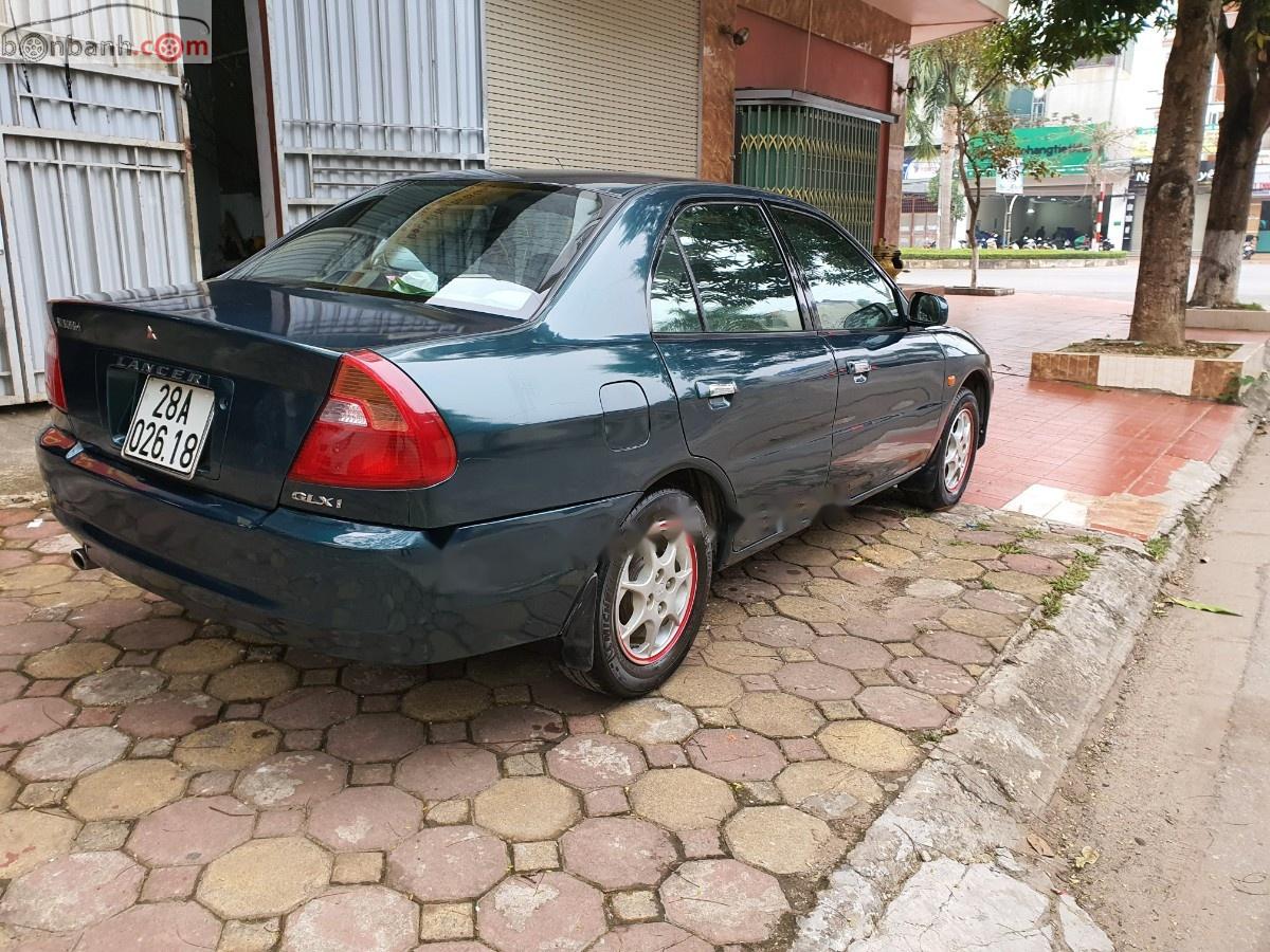 Mitsubishi Lancer GLXI 1.6 MT 2002 - Bán Mitsubishi Lancer sản xuất năm 2002, màu xanh lam, giá tốt