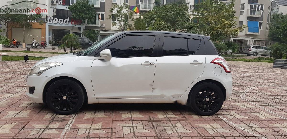 Suzuki Swift 1.4 AT 2015 - Bán xe Suzuki Swift đời 2015, màu trắng chính chủ, giá 379tr