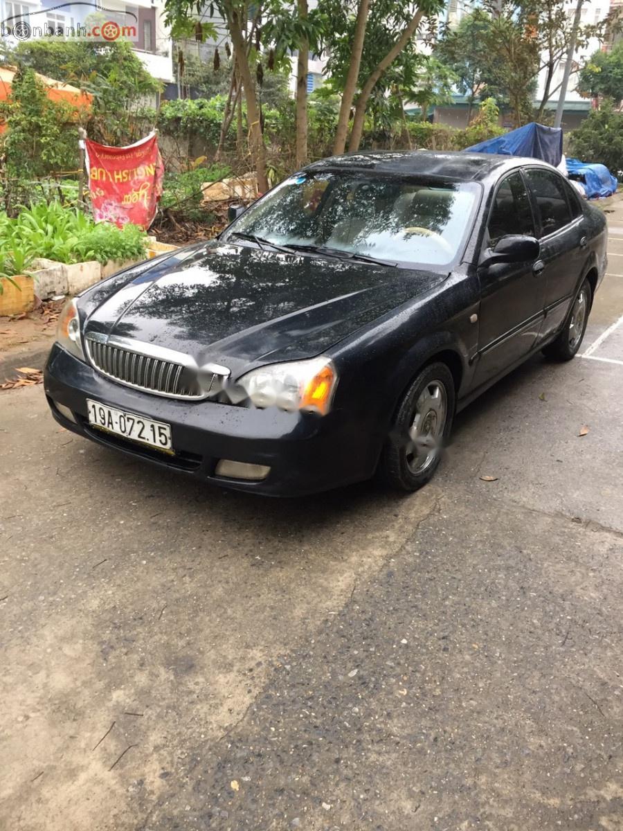 Daewoo Magnus 2.5 AT 2004 - Cần bán Daewoo Magnus 2.5 AT sản xuất năm 2004, màu đen số tự động