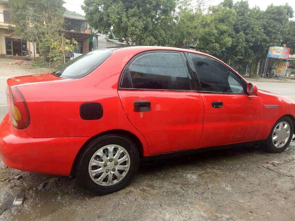 Daewoo Lanos 2002 - Cần bán xe Daewoo Lanos 2002, màu đỏ, nhập khẩu, giá chỉ 58 triệu