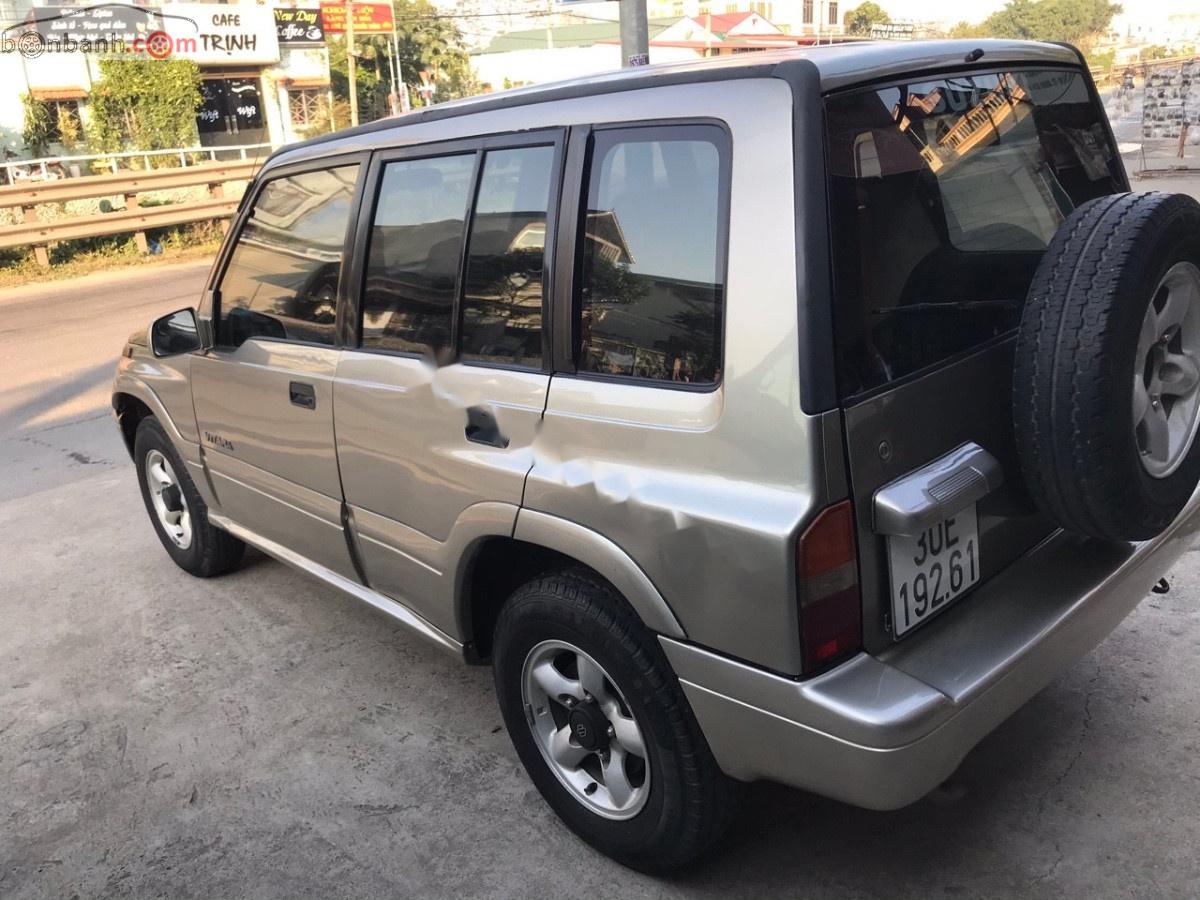 Suzuki Vitara   2005 - Cần bán gấp Suzuki Vitara JLX đời 2005, màu vàng, số sàn