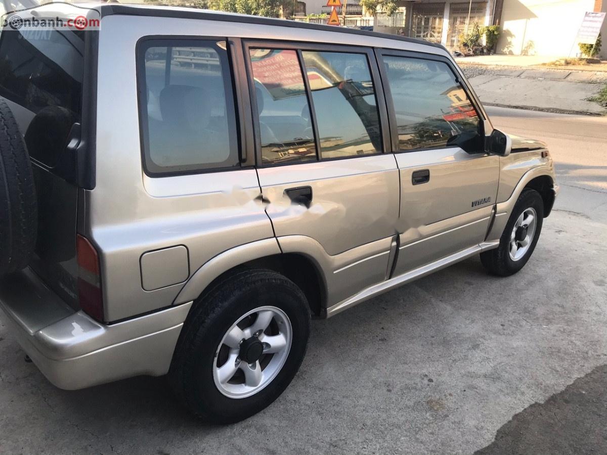 Suzuki Vitara   2005 - Cần bán gấp Suzuki Vitara JLX đời 2005, màu vàng, số sàn