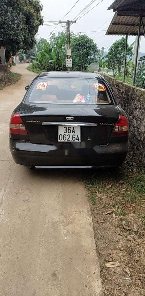 Daewoo Nubira 2003 - Xe Daewoo Nubira năm 2003, màu đen, xe nhập, 60tr