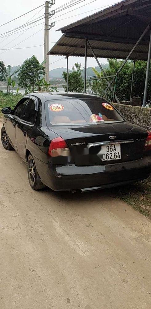 Daewoo Nubira 2003 - Xe Daewoo Nubira năm 2003, màu đen, xe nhập, 60tr