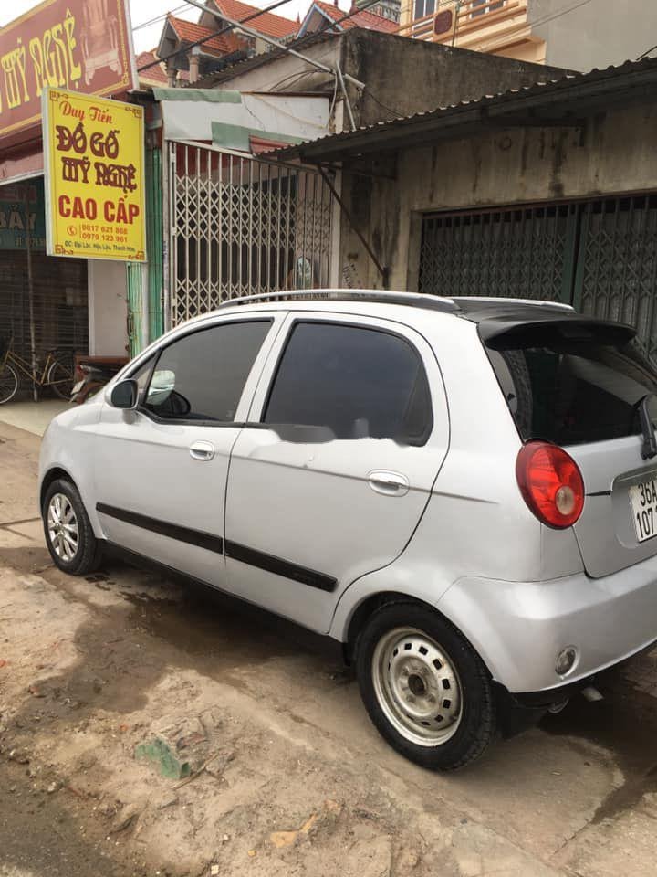 Chevrolet Spark 2010 - Cần bán gấp Chevrolet Spark sản xuất năm 2010, màu bạc