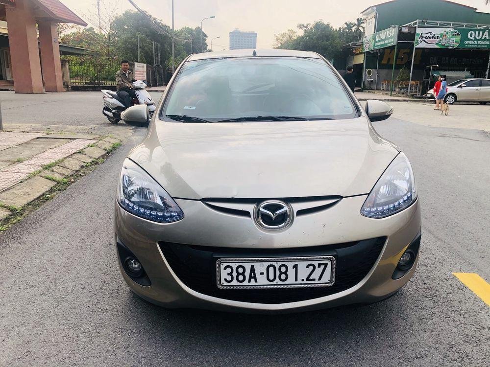 Mazda 2 2014 - Bán xe Mazda 2 đời 2014, màu vàng