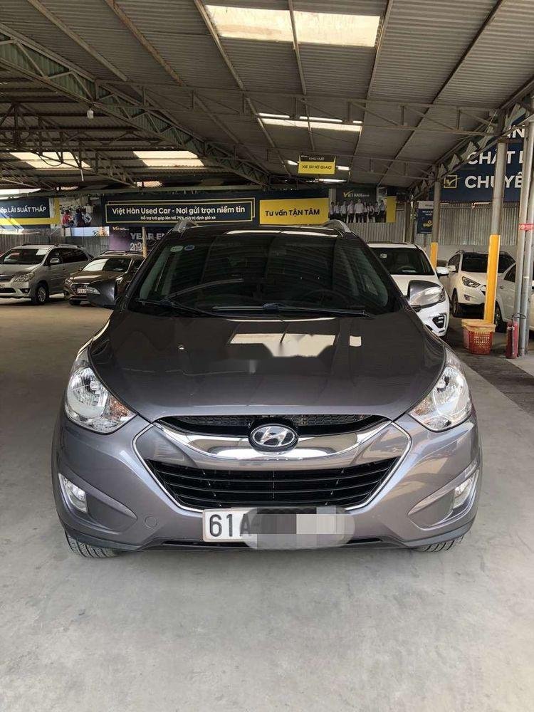 Hyundai Tucson 2011 - Cần bán xe Hyundai Tucson sản xuất năm 2011, màu xám, nhập khẩu, giá tốt