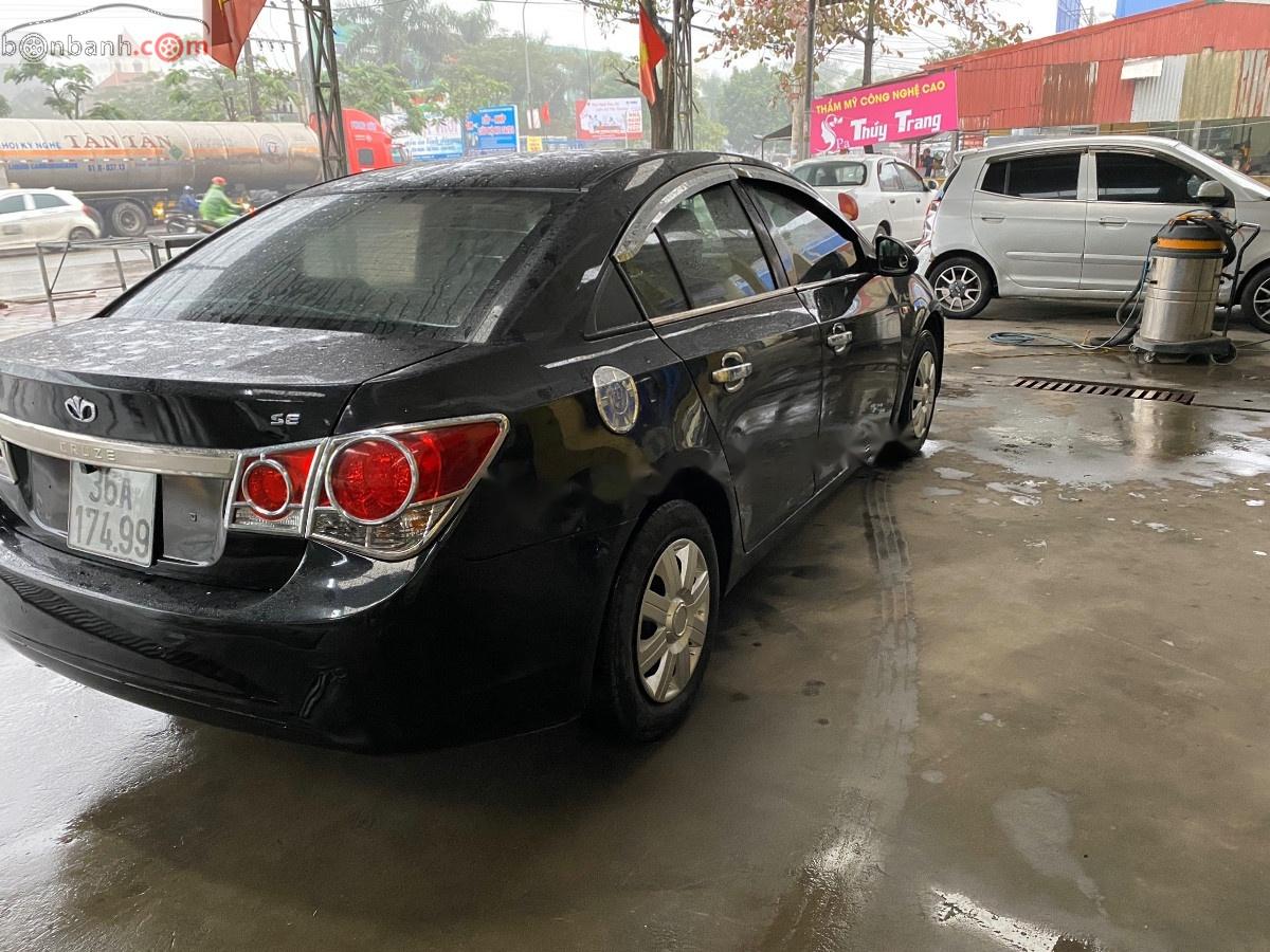 Daewoo Lacetti 2010 - Cần bán lại xe Daewoo Lacetti sản xuất 2010, màu đen, nhập khẩu nguyên chiếc số sàn