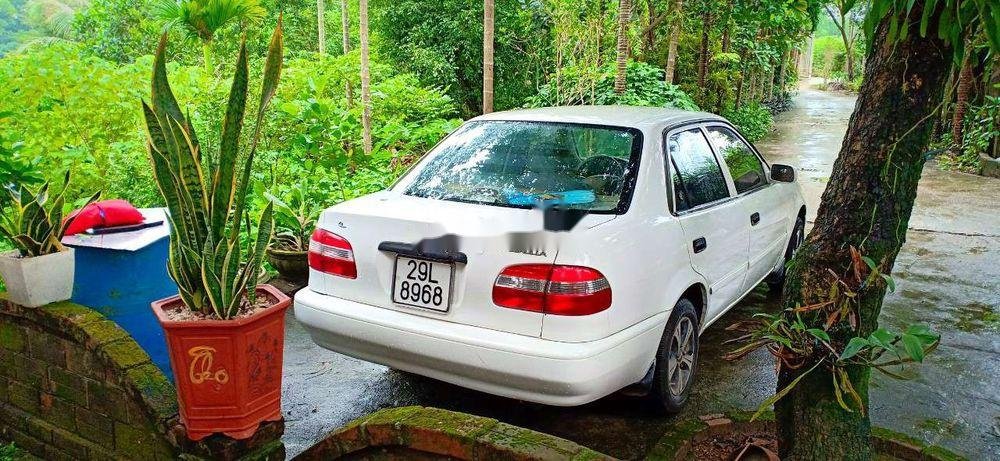 Toyota Corolla 2001 - Bán xe Toyota Corolla 2001, màu trắng giá cạnh tranh