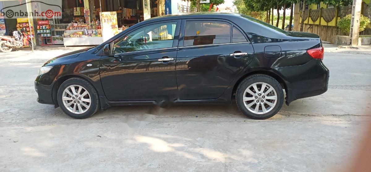 Toyota Corolla 2008 - Cần bán lại xe Toyota Corolla GLi 1.8 AT năm sản xuất 2008, màu đen, xe nhập, giá chỉ 390 triệu