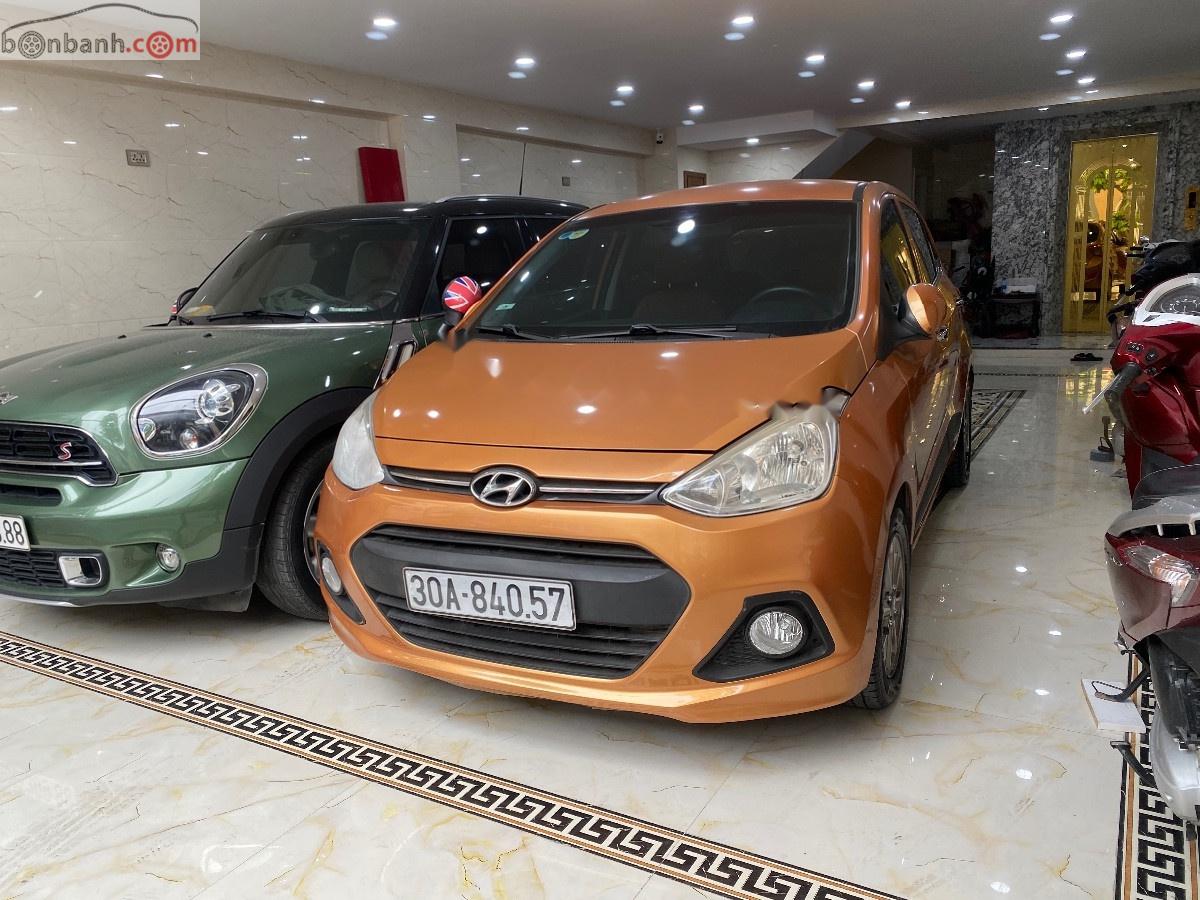 Hyundai Grand i10  1.2 AT 2015 - Bán xe Hyundai Grand i10 1.2 AT năm sản xuất 2015, màu vàng, nhập khẩu nguyên chiếc 