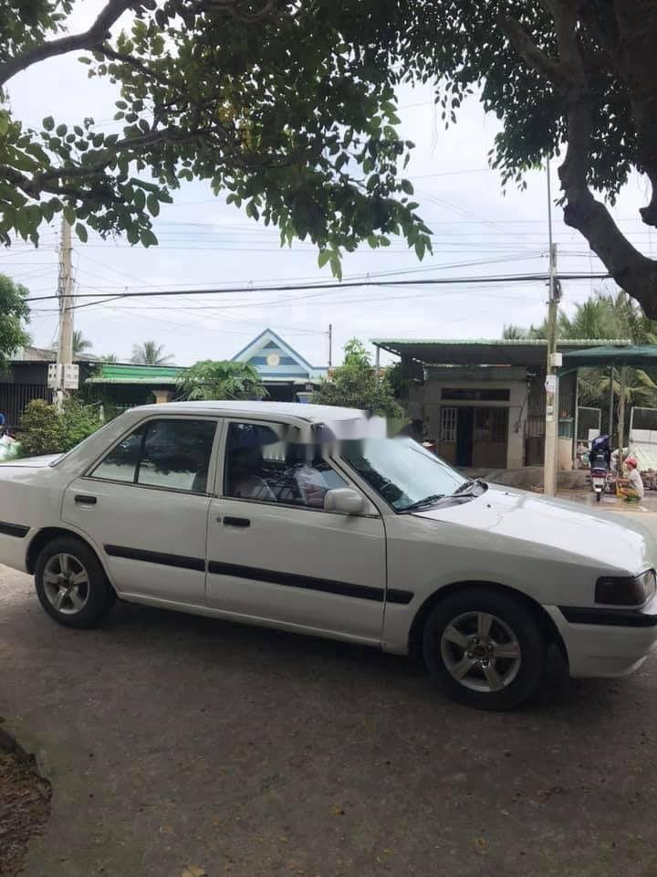 Mazda 323F 1999 - Bán ô tô Mazda 323F sản xuất 1999, màu trắng chính chủ, 30 triệu