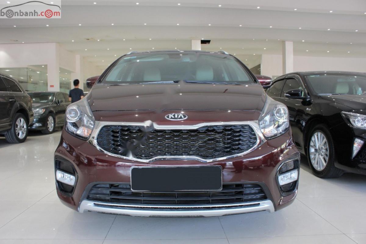 Kia Rondo GAT 2.0AT 2018 - Cần bán xe Kia Rondo GAT 2.0AT sản xuất 2018, màu nâu số tự động, 575 triệu