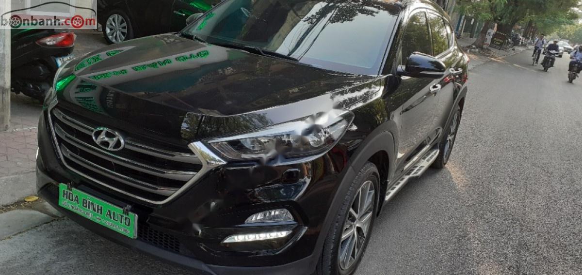 Hyundai Tucson   2017 - Cần bán xe Hyundai Tucson 2017, màu đen, xe nhập, 795 triệu