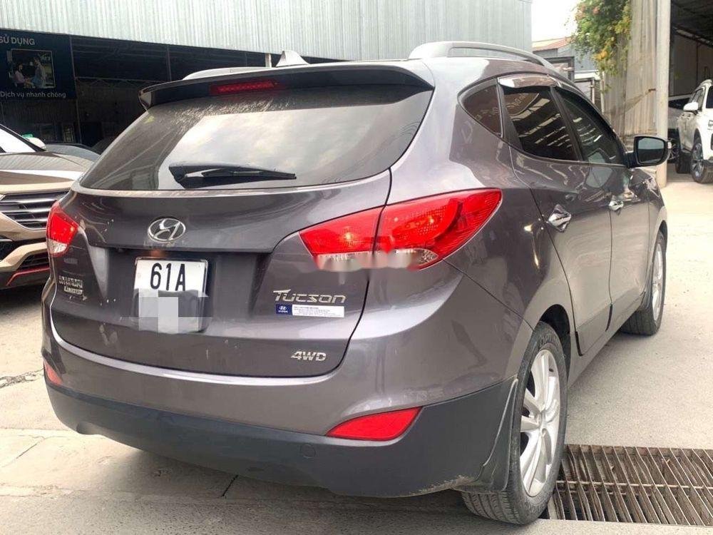 Hyundai Tucson 2011 - Cần bán xe Hyundai Tucson sản xuất năm 2011, màu xám, nhập khẩu, giá tốt