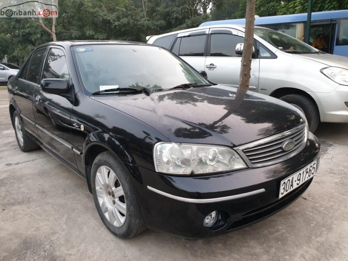 Ford Laser 1.8 AT ghia 2005 - Bán Ford Laser 1.8 AT ghia đời 2005, màu đen số tự động, giá chỉ 199 triệu