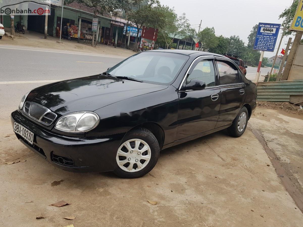 Daewoo Lanos 2001 - Cần bán Daewoo Lanos năm 2001, màu đen