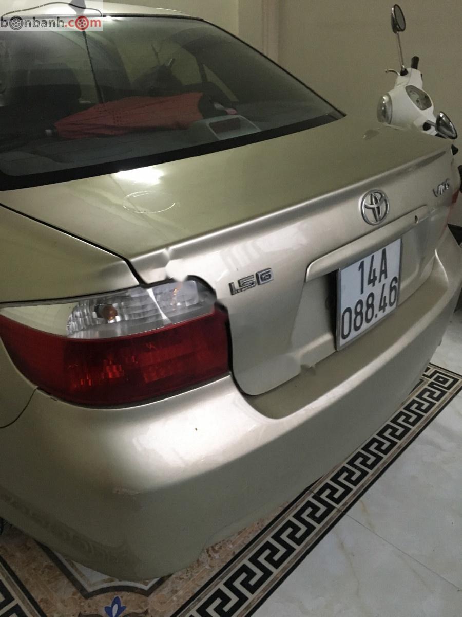 Toyota Vios 2004 - Cần bán Toyota Vios sản xuất 2004, màu vàng, giá tốt