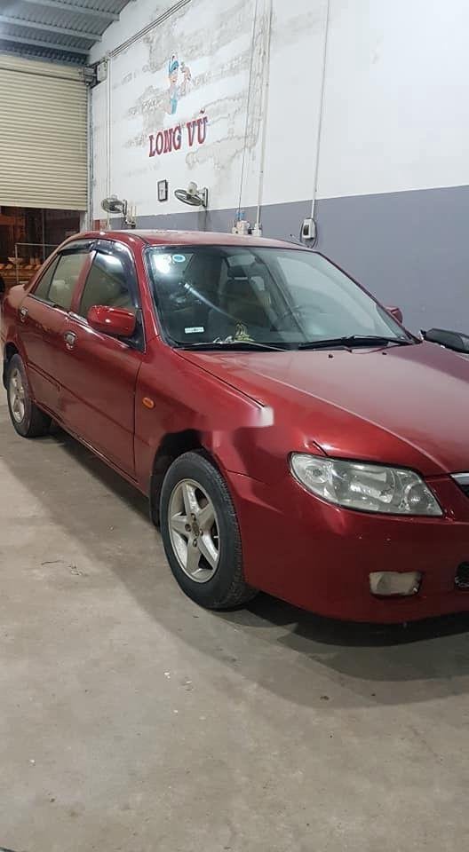 Mazda 323   2002 - Bán Mazda 323 đời 2002, màu đỏ