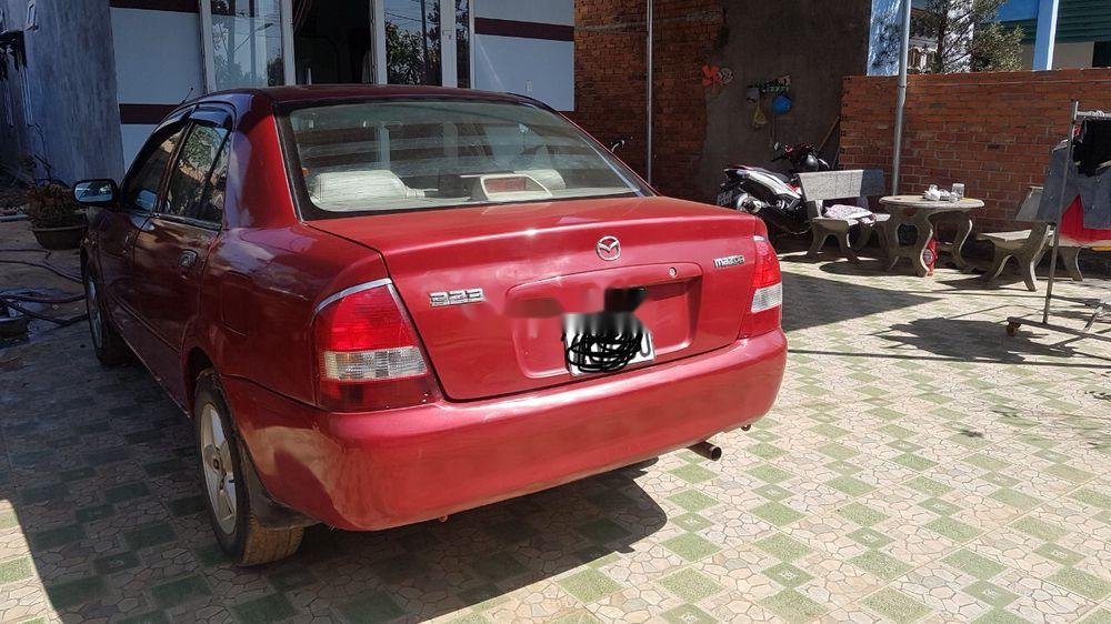 Mazda 323   2002 - Bán Mazda 323 đời 2002, màu đỏ