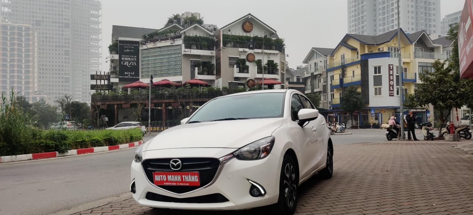 Mazda 2  1.5 AT 2018 - Cần bán xe Mazda 2 1.5 AT đời 2018, màu trắng, chính chủ