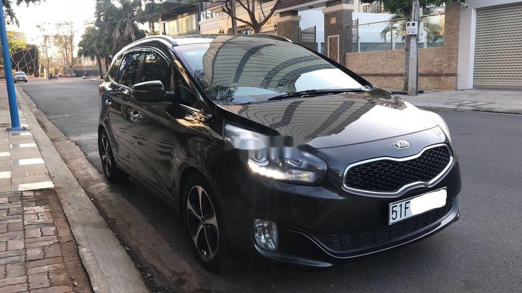 Kia Rondo   AT 2016 - Bán Kia Rondo AT năm sản xuất 2016, màu đen số tự động