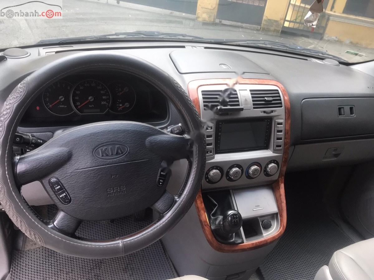 Kia Carnival 2.5 MT 2005 - Cần bán Kia Carnival 2.5 MT sản xuất 2005, màu đen, nhập khẩu, 225 triệu