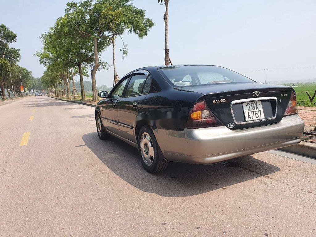 Daewoo Magnus 2005 - Bán ô tô Daewoo Magnus AT đời 2005, màu đen số tự động